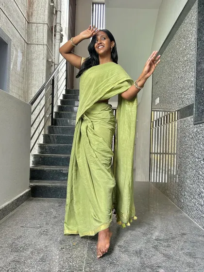 Another pose in the same beautiful saree. Capturing the flow and movement of the fabric.