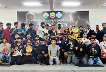 A formal team photo with our championship trophies. This picture represents the strength, unity, and success of Thunder Martial Arts.