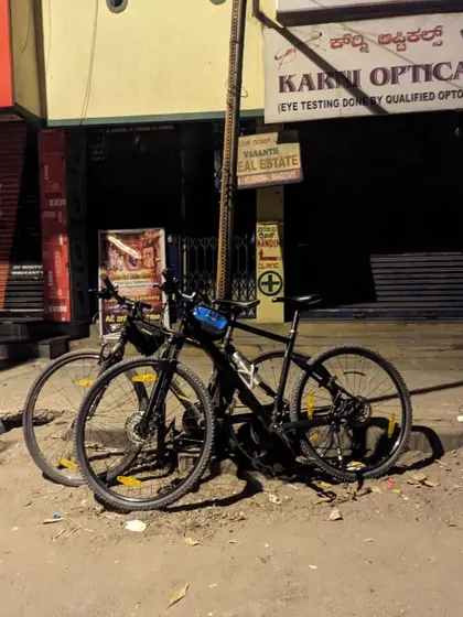 Two bikes parked on a quiet street corner. This was from our first ride back after a break, a simple stack marking our return to the roads.