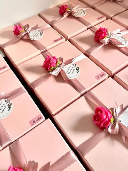 Another angle of the customized bridesmaid boxes, showing the care and detail that goes into the packaging of each gift.