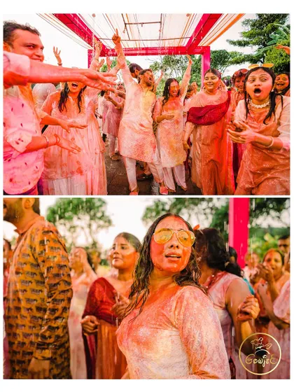 A guest enjoying the vibrant and messy fun of a pre-wedding Holi celebration.