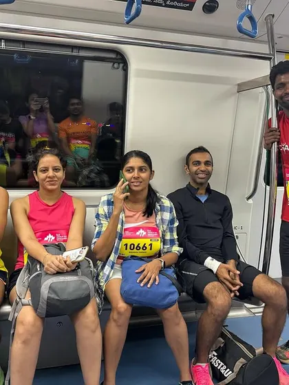 The early morning journey to the race. Our dedication starts before the sun is up, traveling together on the Metro for the TCS 10K.