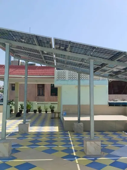 This 10 KW residential On-Grid solar project in West Delhi features an elevated mounting structure. This design preserves the rooftop area for other uses while ensuring the solar panels receive maximum sun exposure for optimal energy generation.