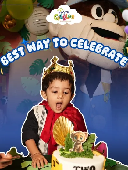 The best way to celebrate is with a special moment. Here, Mr. Giggles stands proudly behind the birthday boy as he gets ready to blow out his candles, making the cake-cutting ceremony even more memorable.