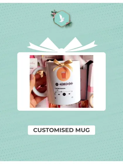 A modern and personal gift, this customized mug features a scannable Spotify code that plays a special song. It's a unique way to share a memory or feeling, and a great addition to any gift hamper.