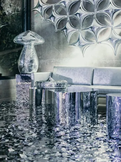 A lounge area at 'The Melting Disco Ball'. We used amorphously shaped glittering blobs and reflective surfaces to transport guests back to the iconic era of disco, creating an after-party for those seeking the extraordinary.