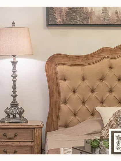 This classic table lamp, with its ornate carved base, is the perfect companion to a tufted headboard. The warm light it casts enhances the cozy and luxurious feel of the bedroom.