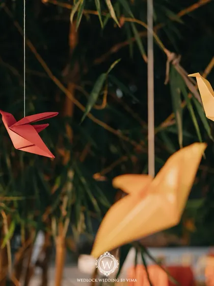 This Haldi ceremony was a burst of color and unforgettable moments. We used vibrant tissue flowers, playful origami birds, and colorful smoke bombs to bring the venue to life.