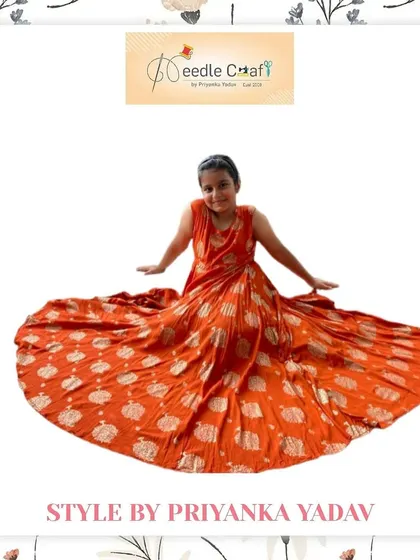 A full view of the custom orange printed dress, designed with a beautiful flare. This outfit is made from a lightweight, breathable fabric, ensuring comfort for all-day wear during celebrations.