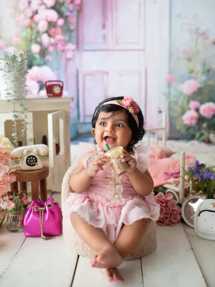 This chic little bub is enjoying her "coffee" in a beautiful pink floral setup. I love combining themes to create something truly unique for each client.