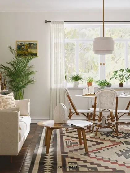This living-dining area uses a bold patterned rug and natural plants to create a fresh and inviting atmosphere, perfect for small apartment living.