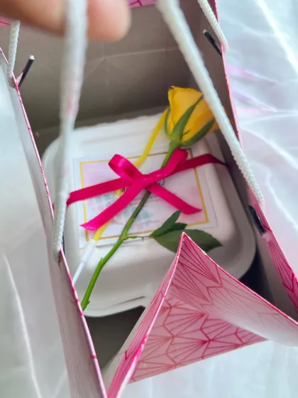 Various examples of my gift wrapping, showing different combinations of ribbons, flowers, and bags to suit any occasion.