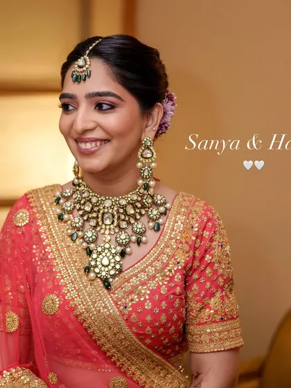 A portrait of Sanya, capturing her warm smile and the soft, semi-matte makeup that enhanced her natural glow.
