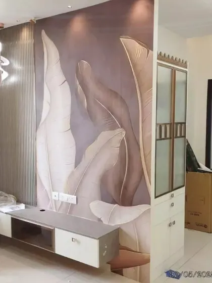 This large-leaf botanical mural adds a touch of modern drama to this living area. Our custom printing ensures the design fits perfectly around the media unit and partition, creating a seamless, high-impact look.