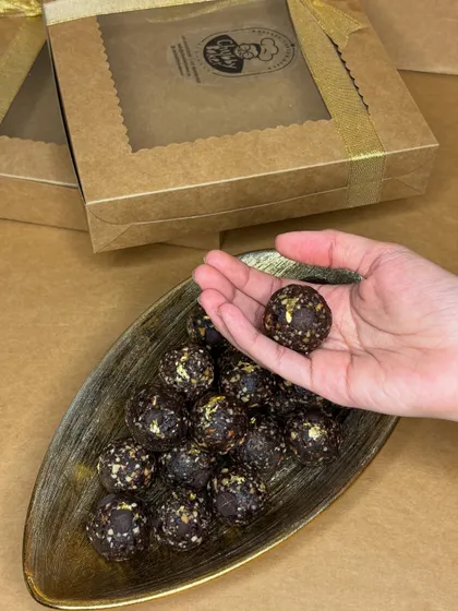 This is the Belgian Chocolate Roasted Almond Ladoo, another one of my healthy festive offerings. It's topped with edible gold leaf for an extra special touch.