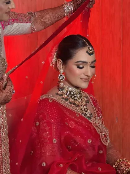 A touching moment as the bride's mother helps with the veil. These are the memories I help create, ensuring the bride looks perfect for every precious second.