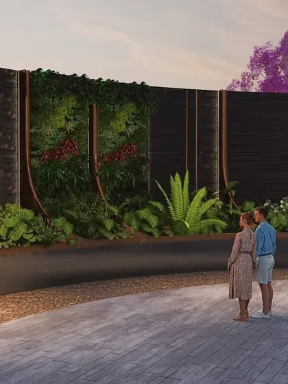 A curved feature wall at a Suyug property combines dark wood, vertical green panels, and a backlit screen. This element acts as both a privacy screen and a piece of public art, enhancing the aesthetic of the community space, especially at sunset.