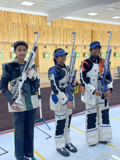 Our 13-year-old shooter Tilottama Sen (left) stands with fellow competitors. Her performance at the Indian team trials earned her a junior finals win and a senior finals second place.
