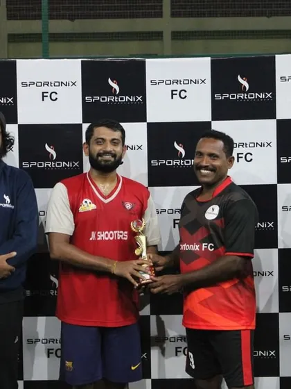 The captain of the runners-up team, Mercurial FC, receiving their trophy. We provide a complete tournament experience for all participants.