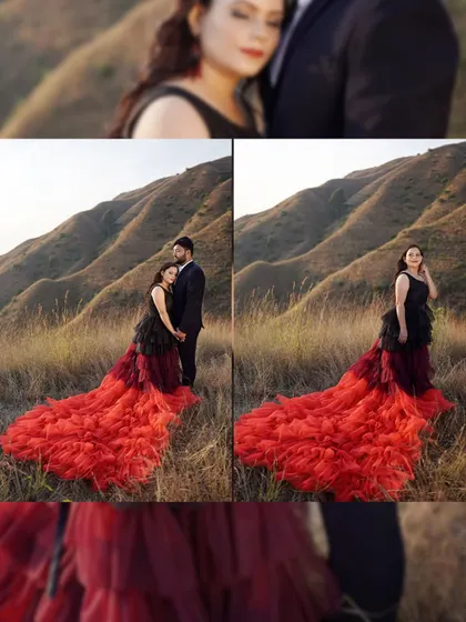 A couple posing in a field with a dramatic red and black gown. The contrast of the dress against the dry, golden hills creates a powerful and high-fashion look.