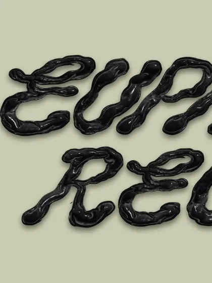 Another detail of the custom "Euphoric Recall" lettering. This view shows more of the word, emphasizing how the letters flow together to create a cohesive and visually strange typographic piece.