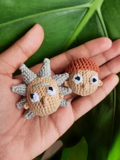 Here are the Rick and Morty heads side-by-side. They make a perfect matching set for fans of the show, available as keychains or pins.