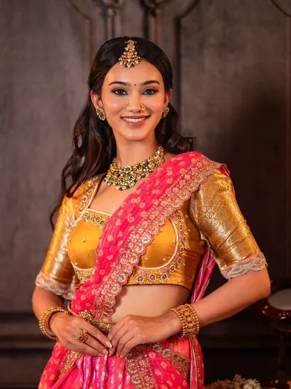 A serene and elegant look for this model, showcasing one of my classic half saree designs. The mustard yellow Kanchi blouse is paired with a pink brocade skirt and an embroidered dupatta.