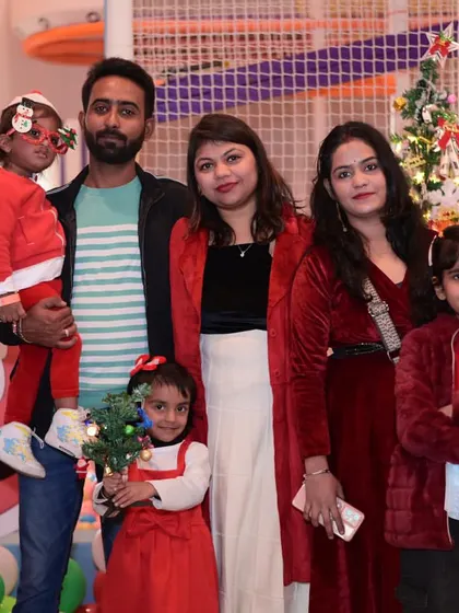 A beautiful family portrait from our Christmas event, capturing the joy of the season.