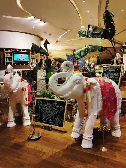 A closer look at the decorated elephant statues at the Sri Lankan Food Festival. The details, like the fabric draping and floral garlands, show our commitment to authentic cultural representation.