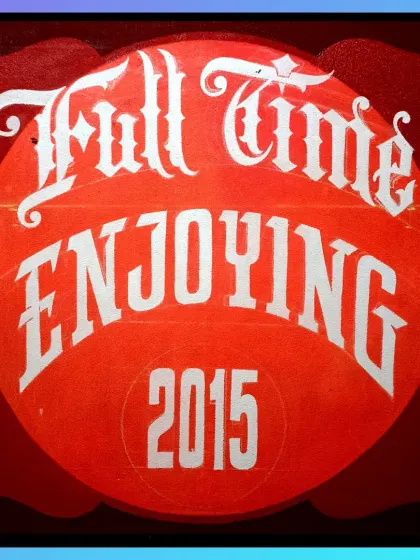 The base lettering for "Full Time Enjoying 2015" is complete. This clean white foundation is what makes the final colors so vibrant.