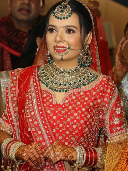 A candid shot capturing the bride's smile. My goal is always to create makeup that allows the bride's personality to shine through.