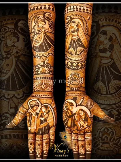 A beautiful Radha Krishna themed bridal mehndi, combining divine figures with traditional wedding scenes. This is a perfect example of the thematic and storytelling-based art that we focus on in our professional courses.