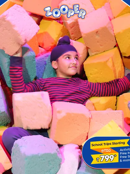 A young student enjoying the soft foam blocks in the pit. My park is designed with different zones to keep every child engaged and happy.