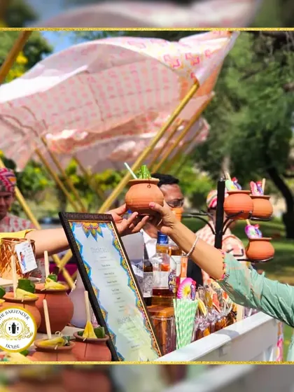 A guest enjoying a refreshing drink served in a traditional kulhad. This is the kind of authentic, memorable interaction we love to create at our events.