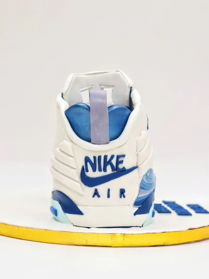 Another angle of the back of the Nike sneaker cake, highlighting the sculpted details.
