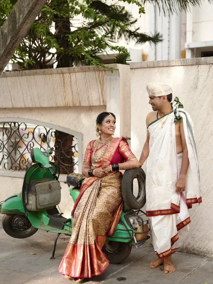A fun, candid moment with the couple. The makeup is long-lasting and holds up perfectly even during outdoor photoshoots, ensuring the bride looks fresh throughout.