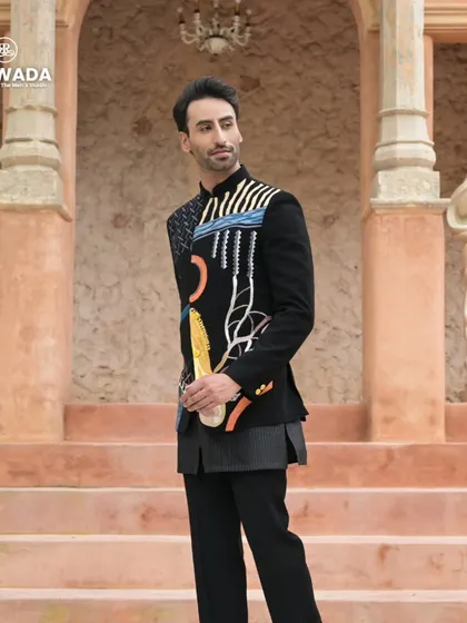 A three-quarter view of the abstract art bandhgala, capturing the dynamic and artistic nature of the embroidery.