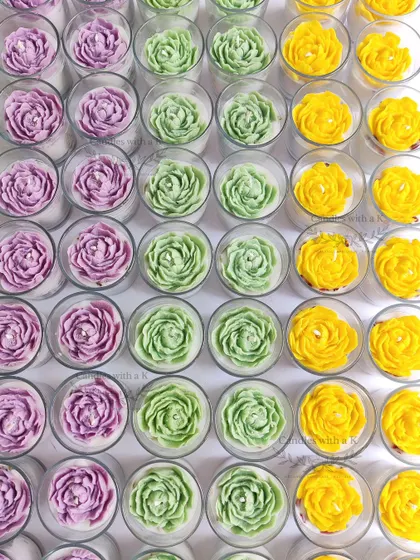 A vibrant array of peony votive candles in purple, green, and yellow, a beautiful and colorful gift for the festival of lights.