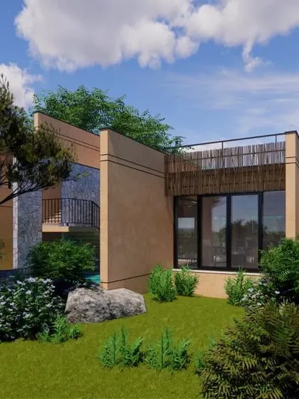 The Earth Abode farmhouse is designed to feel like a part of the landscape, with large windows and open spaces that look out onto the lush, naturalistic garden.