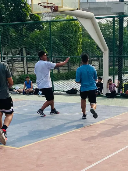 Communication is key. A player directs traffic on the court during a game.