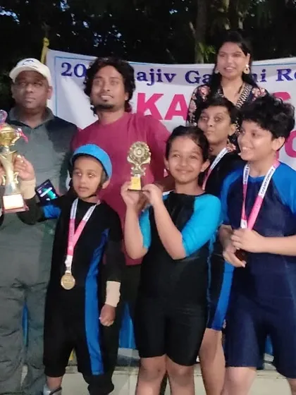 The team celebrating their victory. Participating in competitions teaches sportsmanship and rewards dedication.