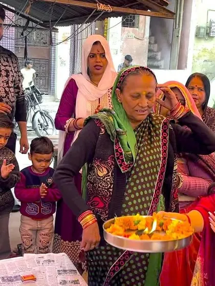 Participating in religious ceremonies during a Mahashivratri event I was invited to. My spiritual beliefs are a source of immense strength in my professional life.