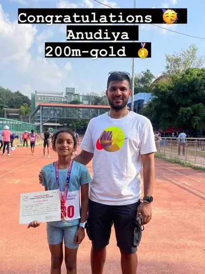 Congratulations to Anudiya for winning gold in the 200m race at the Summer Athletic Meet, seen here with her coach.