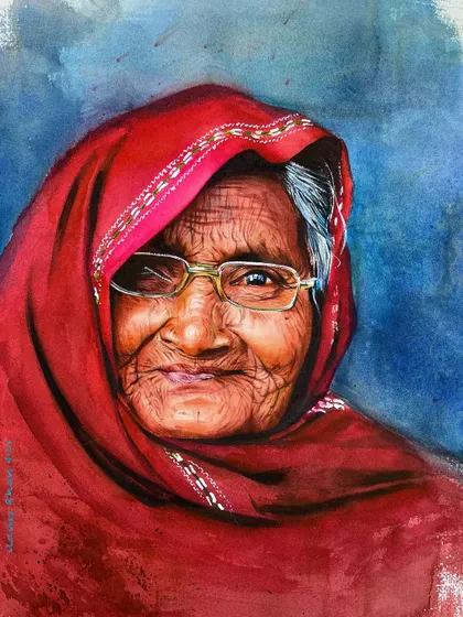 An advanced portrait from a recent online course. The subject's expression and the vibrant red of her headscarf create a powerful and engaging focal point.