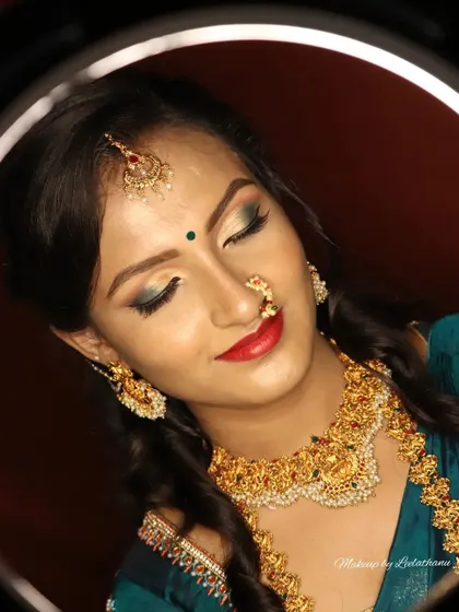 A detailed close-up of a creative eye makeup look. This showcases my technical skill with blending, color, and shimmer, creating a captivating look perfect for a bride or a special photoshoot.