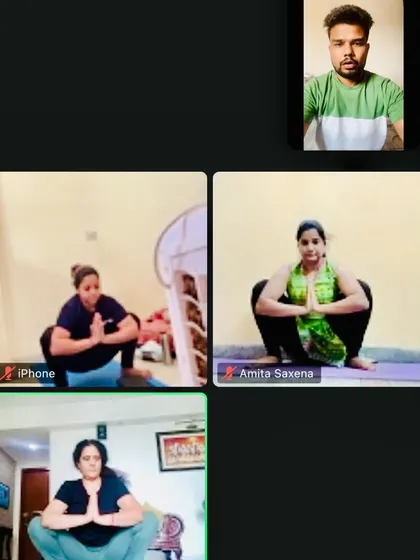 A snapshot from one of our live online group yoga classes. Even through a screen, I make sure to observe everyone's posture, like in this Malasana (Garland Pose), to provide personal corrections and build a strong virtual community.