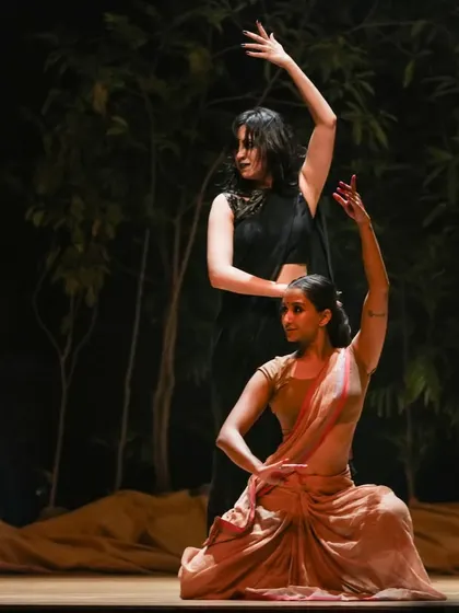 A supportive duet from 'Sitayana', illustrating the relationships between characters through physical connection and movement.