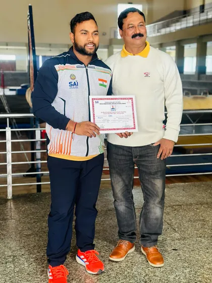 Another picture from my NIS certification. Holding this certificate represents my commitment to providing professional and high-quality gymnastics coaching.