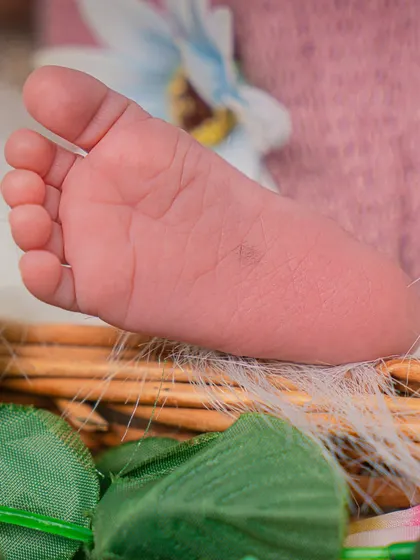 A macro shot of a newborn's tiny foot. These detail shots are a beautiful reminder of just how small they once were.