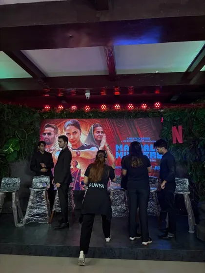 Our team setting up the stage for the Netflix 'Mandala Murders' press event. We ensure the setup matches the theme and technical requirements.